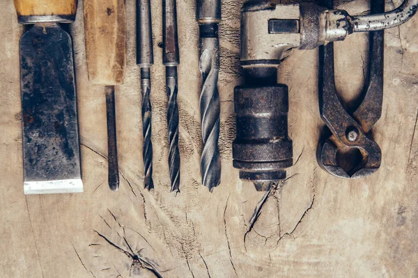 Old construction tools on a wooden workbench flat lay background. Carpenter table. Woodwork — Stock Photo, Image