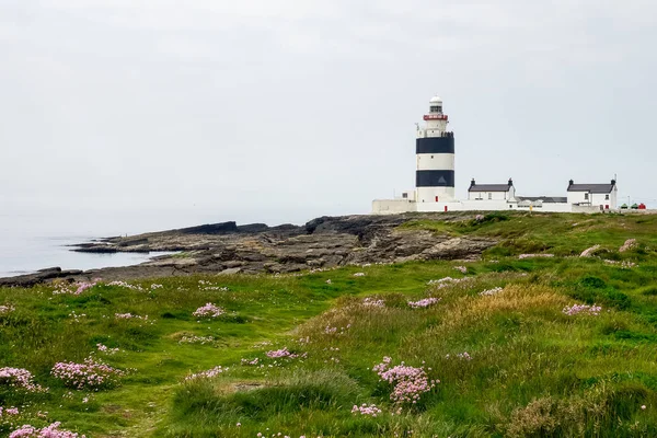 El faro del gancho en el condado de Hook Head Wexford, Irlanda . — Foto de Stock