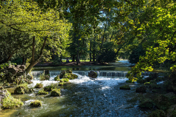 water of the isar in The English Garden, Munich, Germany.