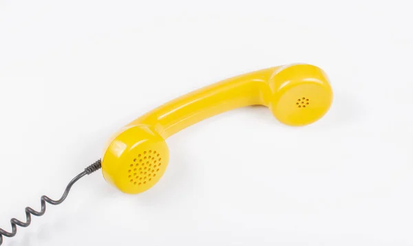 Hand Retro Gele Telefoonhoorn — Stockfoto
