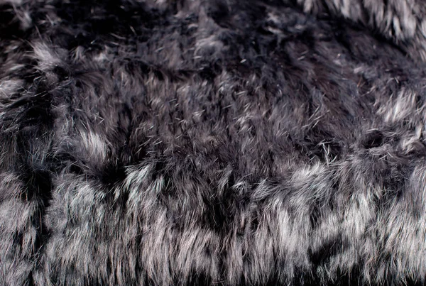 时尚黑白色兔子毛皮被拍为背景 — 图库照片