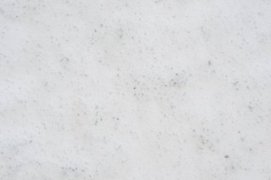 İlkbahar başlangıcı için bir arka plan olarak kar yüzeyi