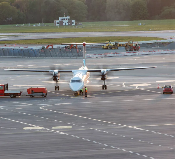 Airplane handling at a gate at Hamburg airport