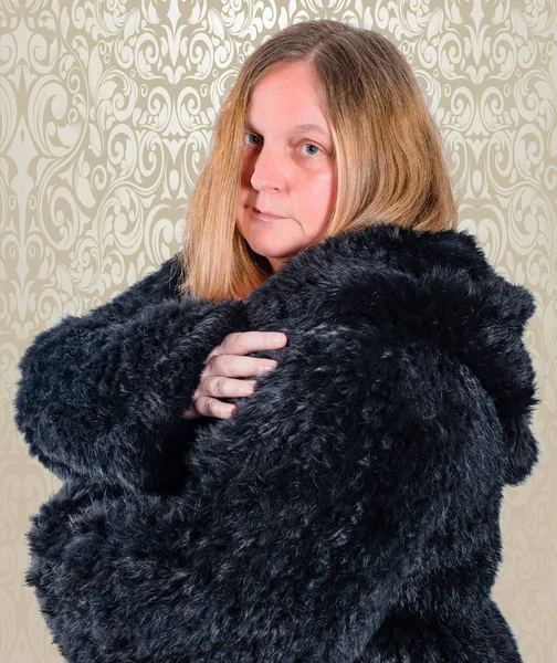 female model wearing a fur jacket