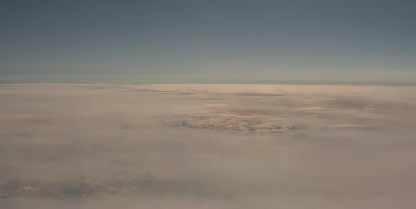 Aerial view of cloud fields above the clouds