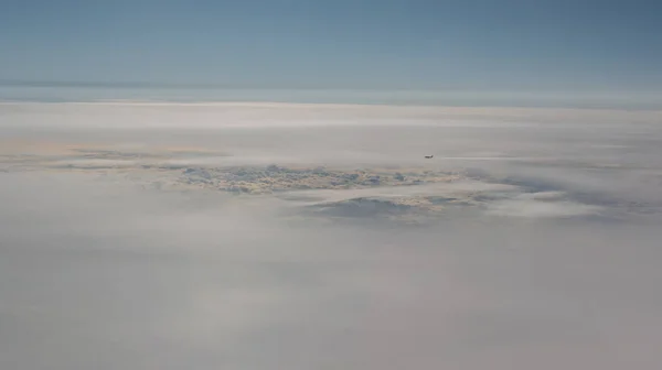 Aerial view of cloud fields above the clouds