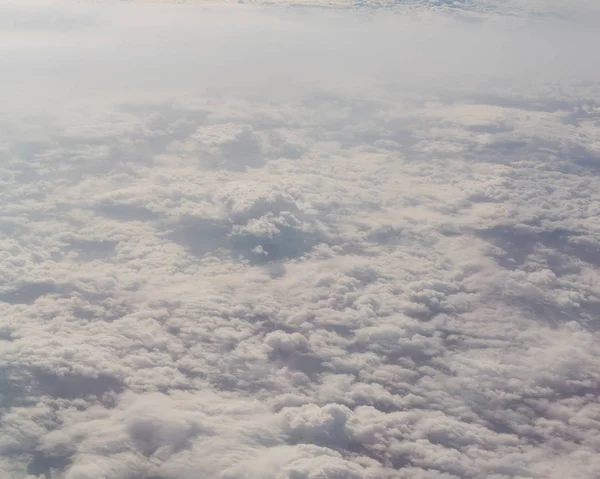 Aerial view of cloud fields above the clouds