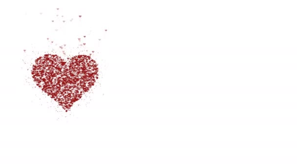 Červené srdce je izolované na bílém pozadí. Nahromadění malých srdcí vytváří jedno velké srdce. Celé srdce se zvětšuje. Zavři to. Kopírovat místo. — Stock video