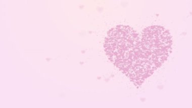 Bulanık pembe kalp açık pembe arka plan üzerinde izole edilir. Küçük kalplerin birikmesi büyük bir kalp yaratır. Doğru tahsisat. Yakından kapatın. Kopyalama alanı.