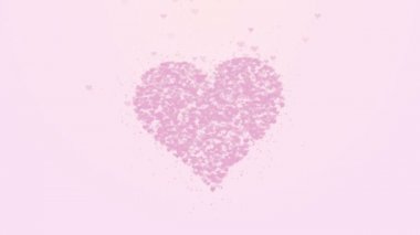 Bulanık pembe kalp açık pembe arka planda izole edilir. Küçük kalplerin birikimi büyük bir kalp oluşturur. Kapat şunu. Boşluk Kopyala.