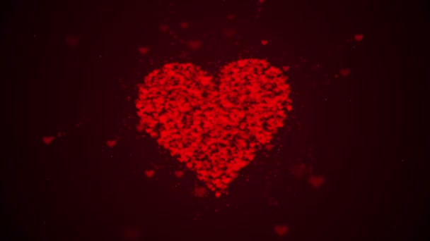 Corazón rojo está aislado sobre fondo borgoña. La acumulación de pequeños corazones crea un gran corazón. Se está ampliando todo el corazón. De cerca. Copiar espacio . — Vídeo de stock