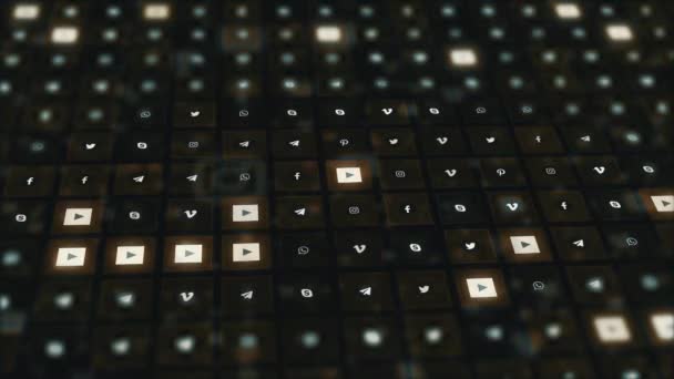 Chernivtsi, Ukraine - June 19, 2019: Popular media channels logos shimmering in sections on the gridded electronic surface. — Stock Video