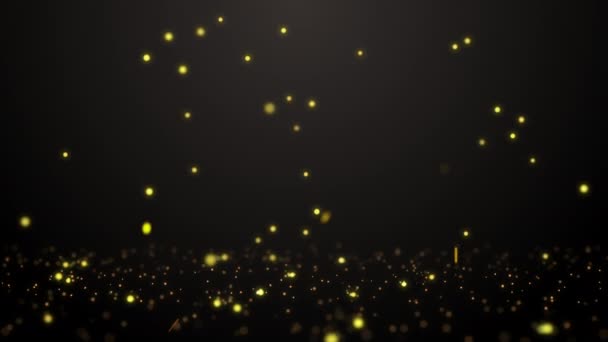 金粒子が輝く抽象的な動きの背景。黒を背景にボケで粒子を粉砕. — ストック動画