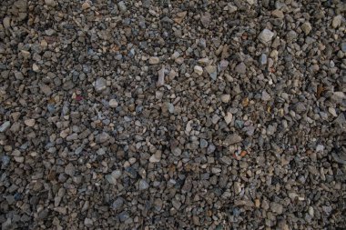 çakıl dokusu dağınık küçük taşlar gri taşlar arkaplan koruyucusu.