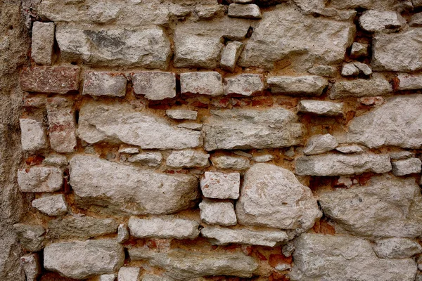 Echte Steinmauer aus alten roten Ziegeln — Stockfoto