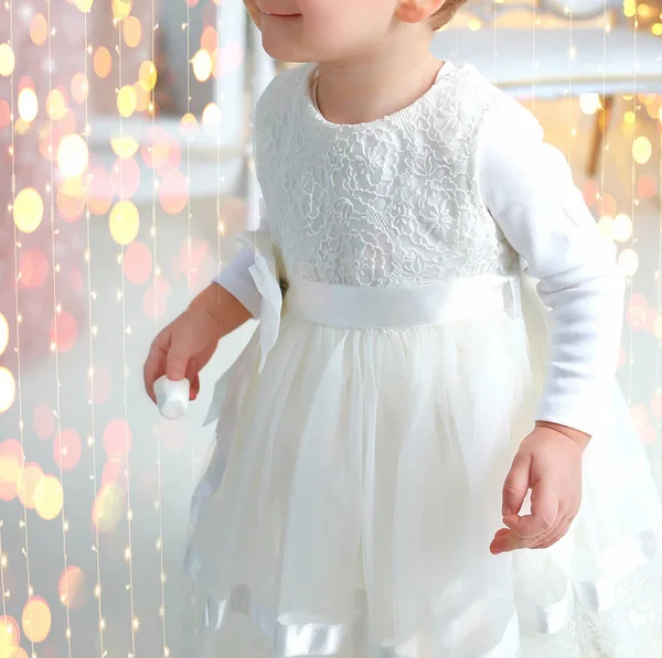 Beautiful baby in New Year 's studio for Christmas with presents — стоковое фото