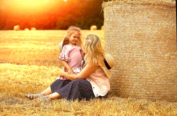 Mom Daughter Caucasians Sitting Together Mown Wheat Field Huge Sheaf — Stock Photo, Image
