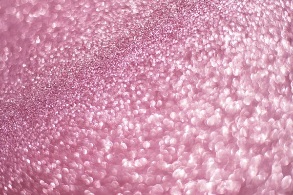 Pembe parlak bir arka planda ışıldıyor. Pembe pullar arka plan bulanıklığı