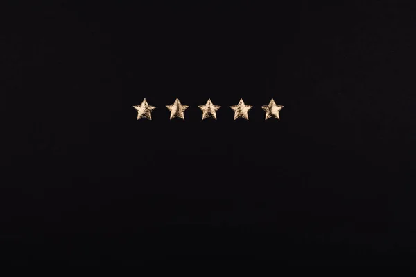 Cinco Estrellas Doradas Sobre Fondo Oscuro — Foto de Stock