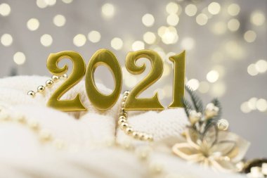 Altın Bokeh geçmişi üzerine 2021 numara. Yeni yıl havası, Noel, tebrik kartı, yeni yıl geçmişi..