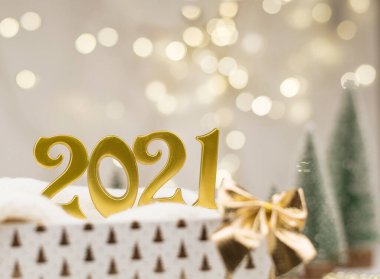 Altın Bokeh geçmişi üzerine 2021 numara. Yeni yıl havası, Noel, tebrik kartı, yeni yıl geçmişi..
