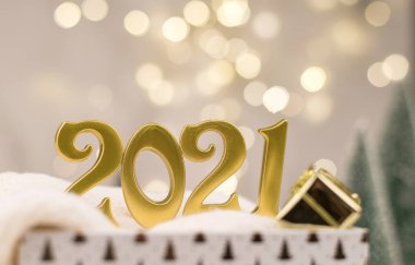 Altın Bokeh geçmişi üzerine 2021 numara. Yeni yıl havası, Noel, tebrik kartı, yeni yıl geçmişi..