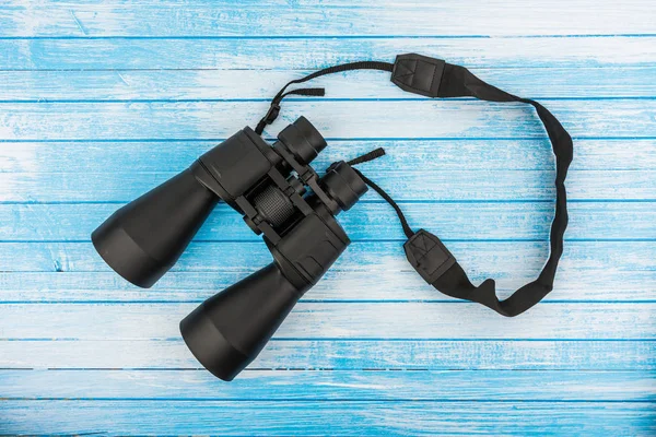 Modern Big Black Binoculars Strap Blue White Painted Wood Background — Stock Photo, Image
