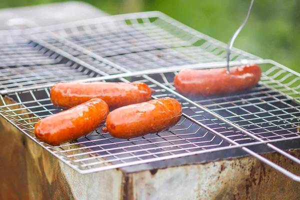 Tasty Sausages Frying Brazier Hot Coals Outdoors Countryside Summer Cooking — 스톡 사진