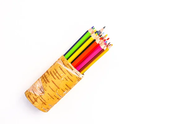 Color pencils in a birch bark organiser — Stock Photo, Image