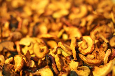Slices of dried organic apples close up.