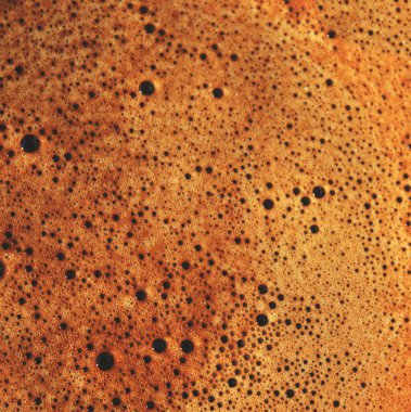 Kabarcıklı kahve arkaplanı. Doğal doku..