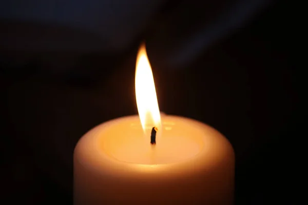 Burning candle on dark background. — Stock Photo, Image