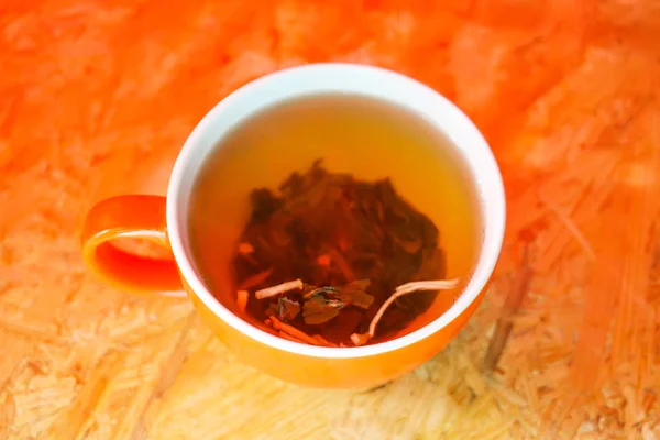 Ceramics cup of hot organic herbal tea. — Stock Photo, Image