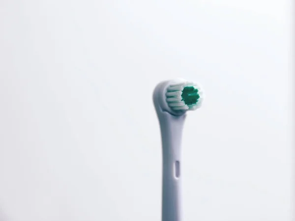 Electrical toothbrush on a white background — Stock Photo, Image