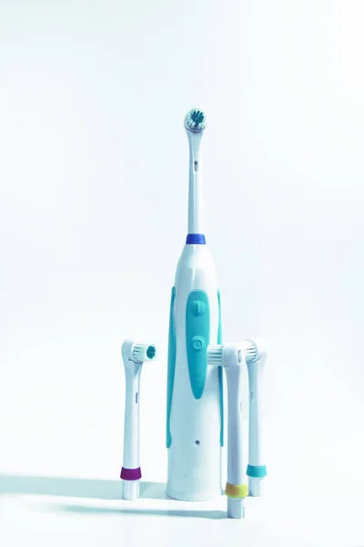 Electrical toothbrushes on a white background — Stock Photo, Image