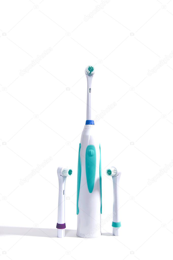 Electric toothbrushes set on white background