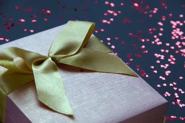 Pink Gift Box Decorated Golden Bow Black Background Small Red Stock Photo