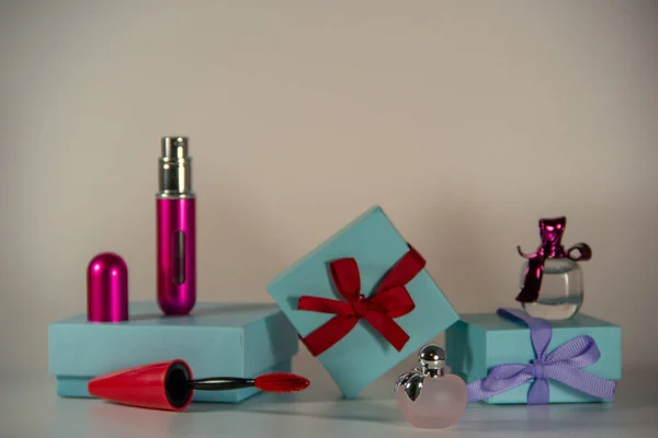 Blue Gift Wrapping Decorated Bows Small Bottles Female Perfume Mascara — Stock Photo, Image