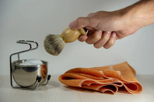 Male Hand Holds Wooden Shaving Razor Brush Next Metal Bowl — Stock Photo, Image
