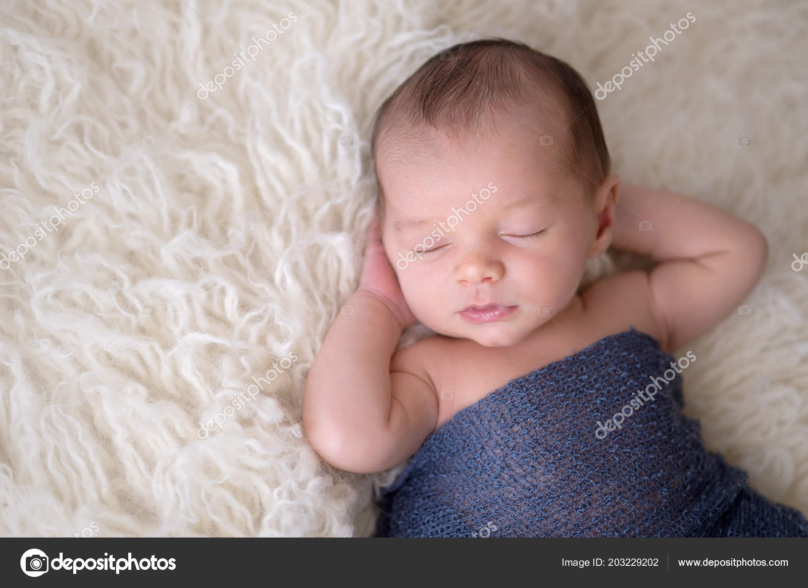 newborn baby boy swaddle