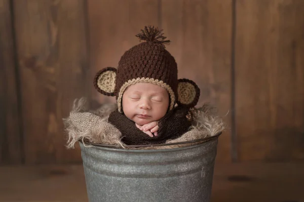 Newborn Baby Boy Wearing a Monkey Hat — Stock Photo, Image