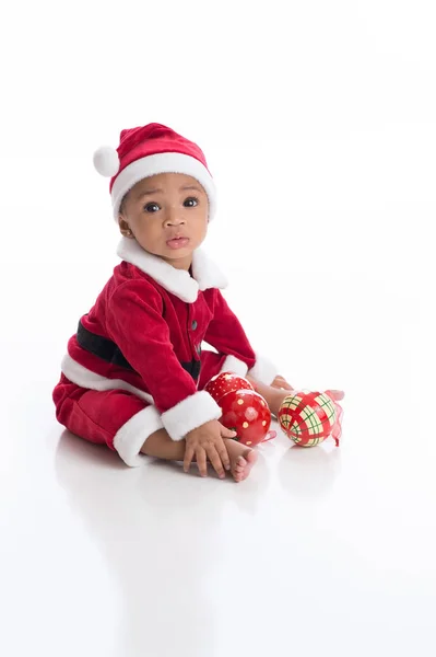 Baby im Weihnachtsanzug lizenzfreie Stockfotos