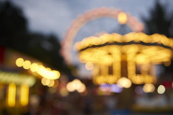 Beautiful french carousel blurred as a background. lights, funny — Stock Photo, Image