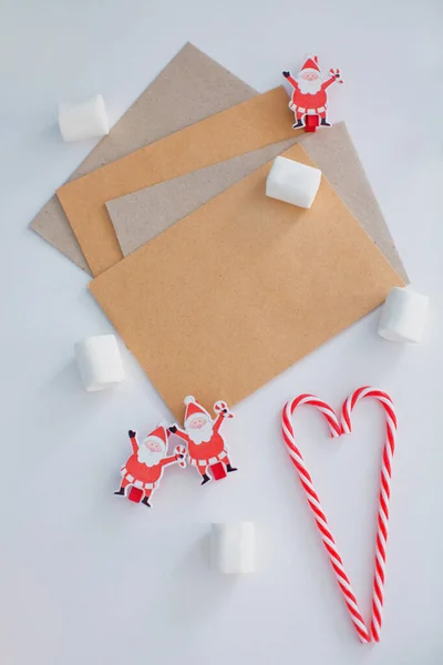 Craft Brown Envelopes Heart Candy Canes Santa Claus Decorations White — Stock Photo, Image
