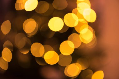 Lens alevlendiriş ışıkları ile bulanık arka plan. Turuncu tonlama. Caner