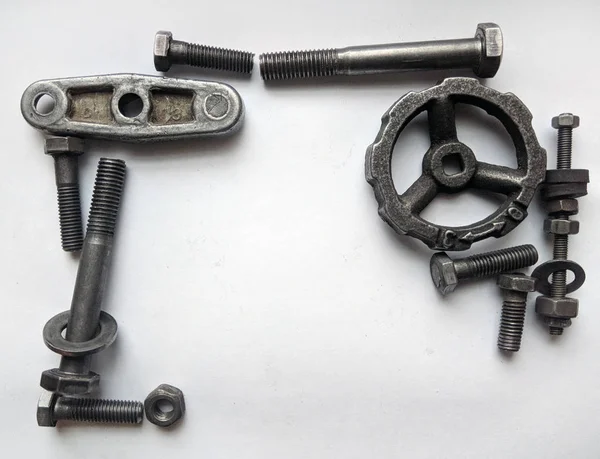 Old dirty nuts and bolts, copy space. naturally  view with shadows — Stock Photo, Image