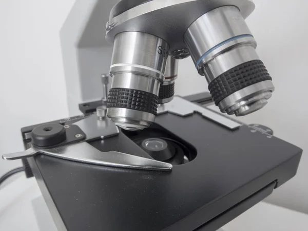 Microscope, examining samples and liquid. technical equipment — Stock Photo, Image