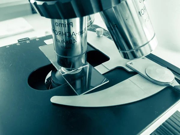 Microscope, examining samples and liquid. technical equipment — Stock Photo, Image