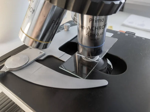 Microscope, examining samples and liquid. technical equipment — Stock Photo, Image