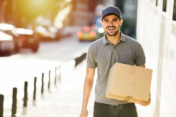 Your Shipping Here Delivery Man Grey Shirt Cap Going Smile — Stock Photo, Image